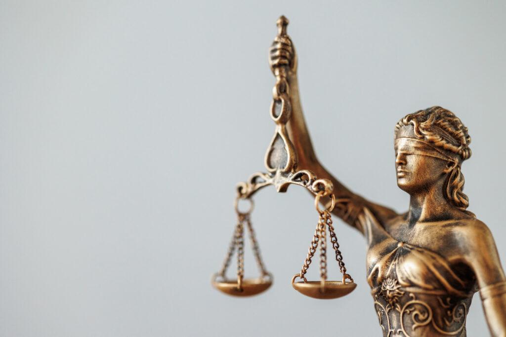 the symbol of justice and justice is a statuette of the goddess Themis judge's gavel. legal advice